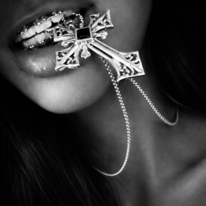 silver cross and parted lips